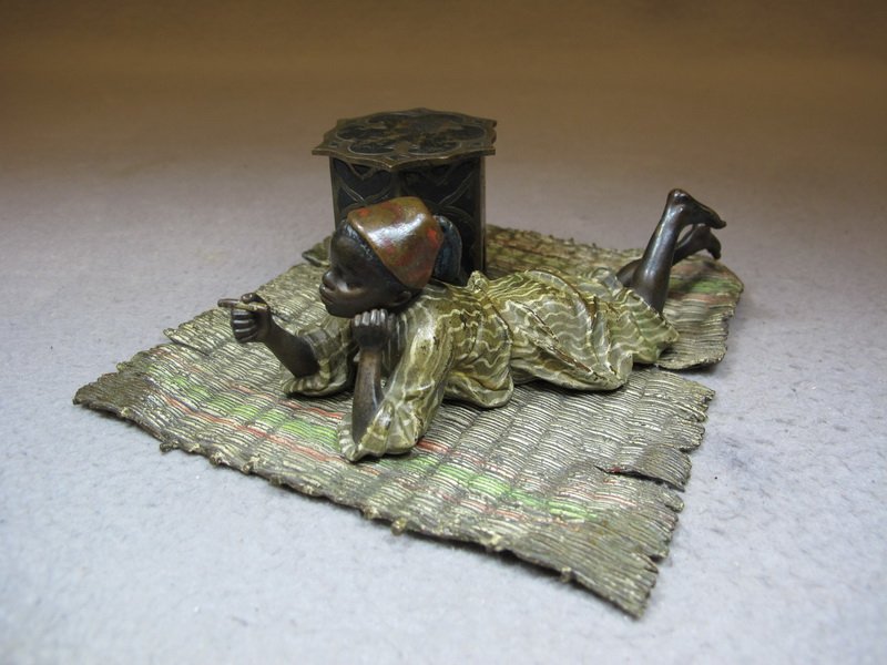Franz BERGMAN (1898-1963) Vienna bronze boy inkwell: Franz BERGMAN (1898-1963) Vienna bronze boy inkwell, signed, original painting. 1 7/8” H x 5 3/4” W x 5 1/2” D. Shipping in USA is $ 10.00 plus insurance. International bidders ask for shipping 