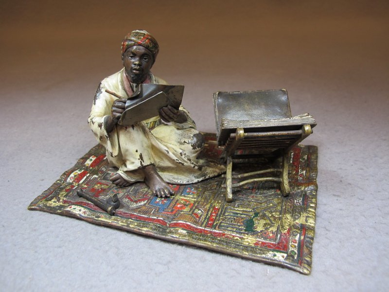 Franz BERGMAN (1898-1963) Vienna bronze man writing scu: Franz BERGMAN (1898-1963) Vienna bronze man writing sculpture, signed, original painting. 3 1/8” H x 5 7/8” W x 4 1/8” D. Shipping in USA is $ 10.00 plus insurance. International bidders ask for