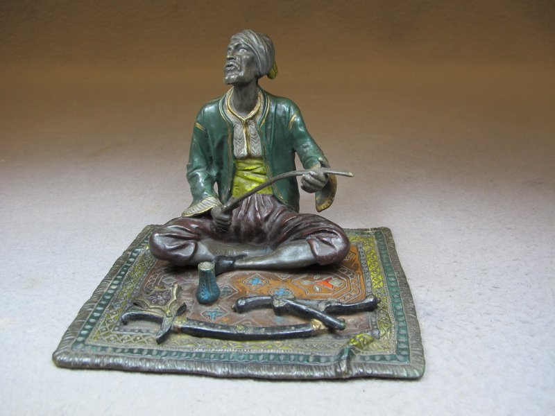 Franz BERGMAN (1898-1963) Vienna bronze man & sword scu: Franz BERGMAN (1898-1963) Vienna bronze man & sword sculpture, signed, original painting. 4 3/8” H x 6” W x 4 1/2” D without base. Shipping in USA is $ 10.00 plus insurance. International bidder