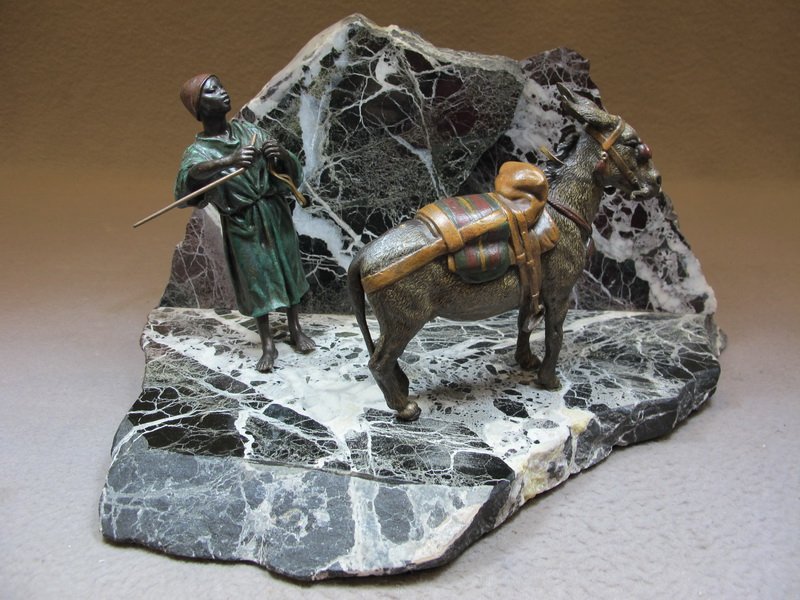 Franz BERGMAN (1898-1963) Vienna bronze man & dunkey sc: Franz BERGMAN (1898-1963) Vienna bronze & marble man & dunkey sculpture, signed, original painting. 7” H x 12 3/4” W including marble, man & dunkey: 5” H. Shipping in USA is $ 25.00 plus insuran