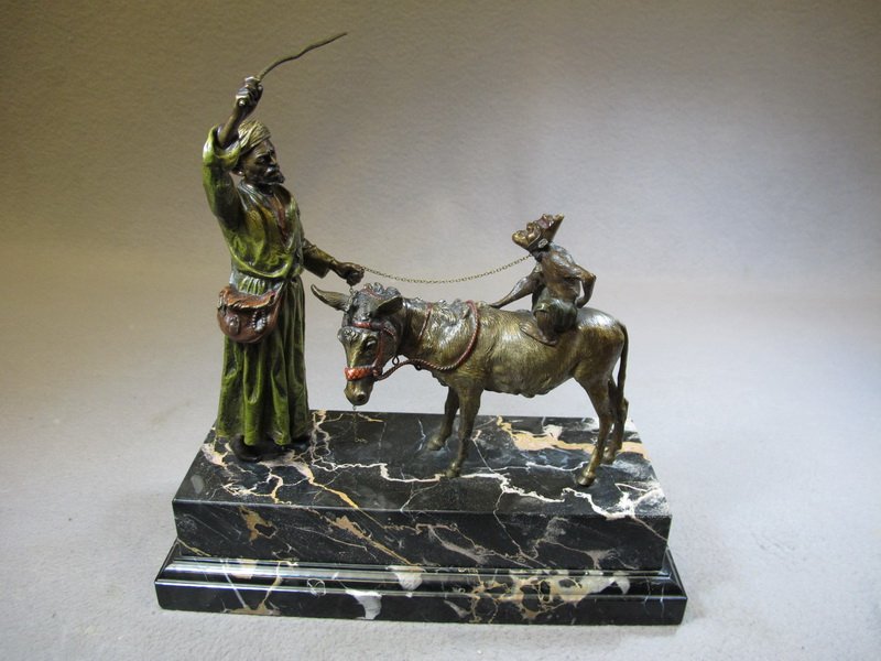 Franz BERGMAN (1898-1963) Orientalist Vienna bronze scu: Franz BERGMAN (1898-1963) Orientalist Vienna bronze man, Dunkey & monkee with a marble base, signed, original painting. 11 1/2” H x 11 1/4” W including marble, Man: 8 1/2” H. Shipping in USA is 