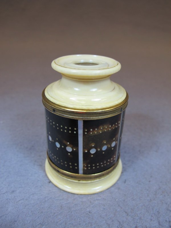 Antique ivory, turtle & mother of pearl lens: Antique ivory, turtle & mother of pearl lens with the original leather case. 2 7/8” H x 2 1/8” diameter. Shipping in USA is $ 15.00. USA or International bidders ask for shipping before bid.