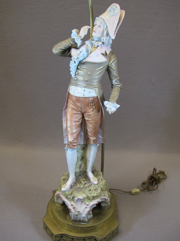 Antique Royal Dux porcelain lamp: Antique Royal Dux porcelain lamp, marked. 41" H total, 23” H just the statue. Shipping in USA is $ 75.00. International bidders ask before bid.