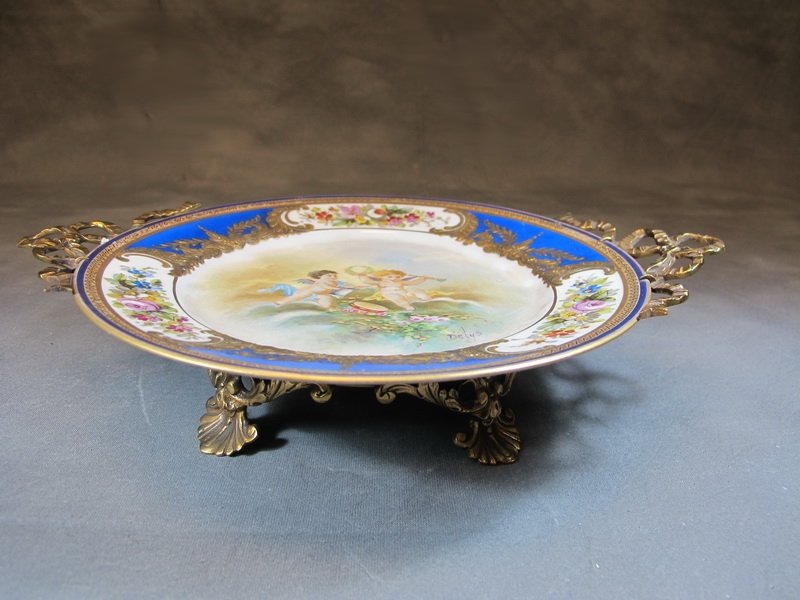 Antique Limoges porcelain & bronze tray: Antique Limoges porcelain & bronze tray, signed. 2 1/2” H x 11 3/8” W x 8 1/2” D. Shipping in USA is $ 40.00. International bidders ask for shipping before bid.