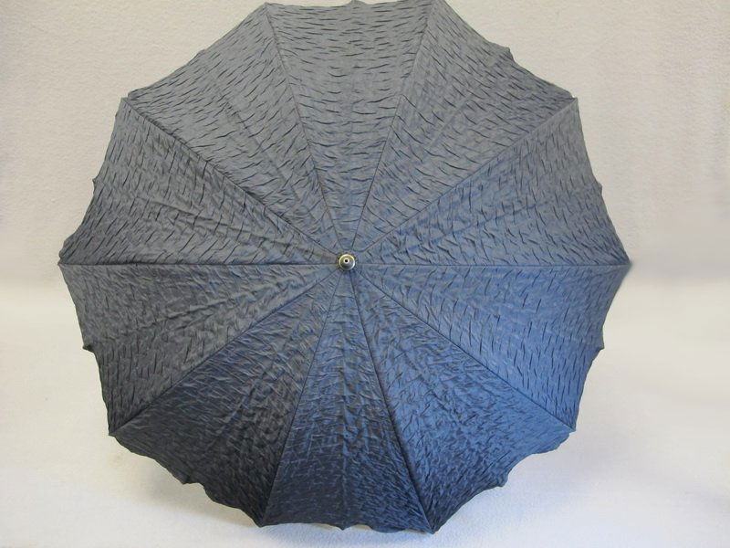 Old French parasol umbrella, Gaspar - Paris: Old French parasol umbrella with a metal handle, made by Gaspar, Paris. 33” H and 31” diameter opened. Shipping in USA is $ 45.00. International bidders ask for shipping before bid.