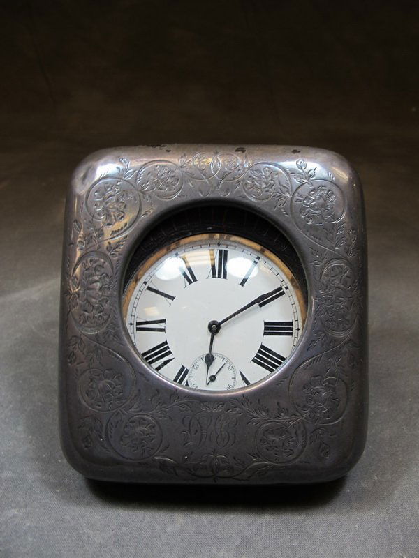 Antique large sterling pocket watch in a case: Antique large sterling pocket watch in a leather case. 4 7/8" H x 4 3/8” W, clock: 3” diameter. Shipping in USA is $ 25.00. International bidders ask before bid.