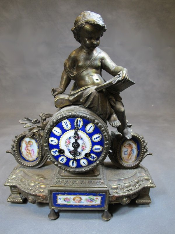 Antique French Japy Freres spelter 7 enamel clock: Antique French Japy Freres spelter & enamel clock. 12 3/4” H. Shipping in USA is $ 45.00. USA or International bidders ask for shipping before bid.