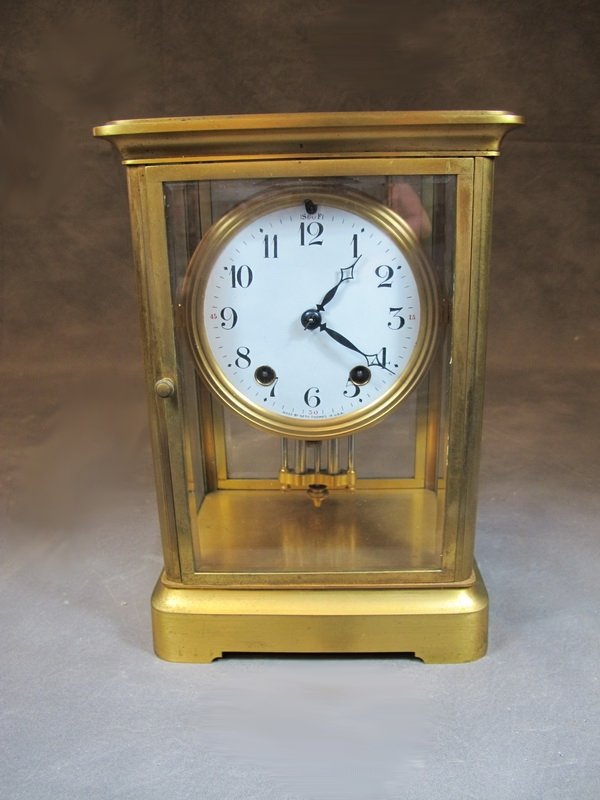 Seth Thomas crystal regulator clock: Seth Thomas crystal regulator clock, with pendulum and key, signed. 9 3/4” H. Shipping in USA is $ 30.00. USA or International bidders ask for shipping before bid.