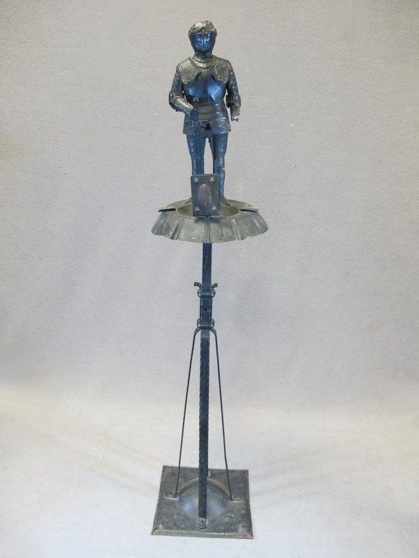 Antique iron armor ashtray: Antique iron armor ashtray. 36 1/4" H. Shipping in USA is $ 65.00. USA or International bidders ask for shipping before bid.