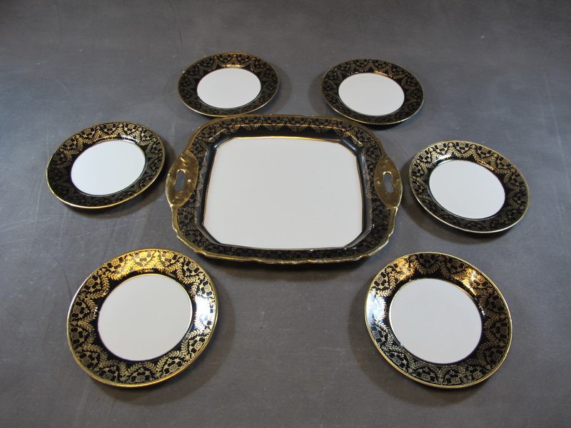 Antique Limoges set of 6 porcelain plates & tray: Antique Limoges set of 6 porcelain plates & tray, marked. Tray: 12 1/8” H x 10” W, Plates: 6 1/2” diameter. Shipping in USA is $ 50.00. International bidders ask for shipping before bid.