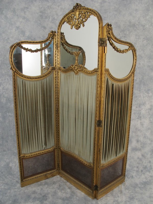 Antique French gilt wood 3 panels mirrored screen: Antique French gilt wood 3 panels mirrored screen. 69” H x 46” W. Shipping in USA is $ 225.00. International bidders ask for shipping before bid.