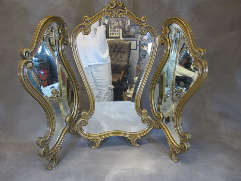 Antique French Louis XV gilt mirror: Antique French Louis XV gilt mirror with a beveled glass. 26" H x 32 1/8” W total including the 3 panels. Shipping in USA is $ 60.00. International bidders ask for shipping before bid.