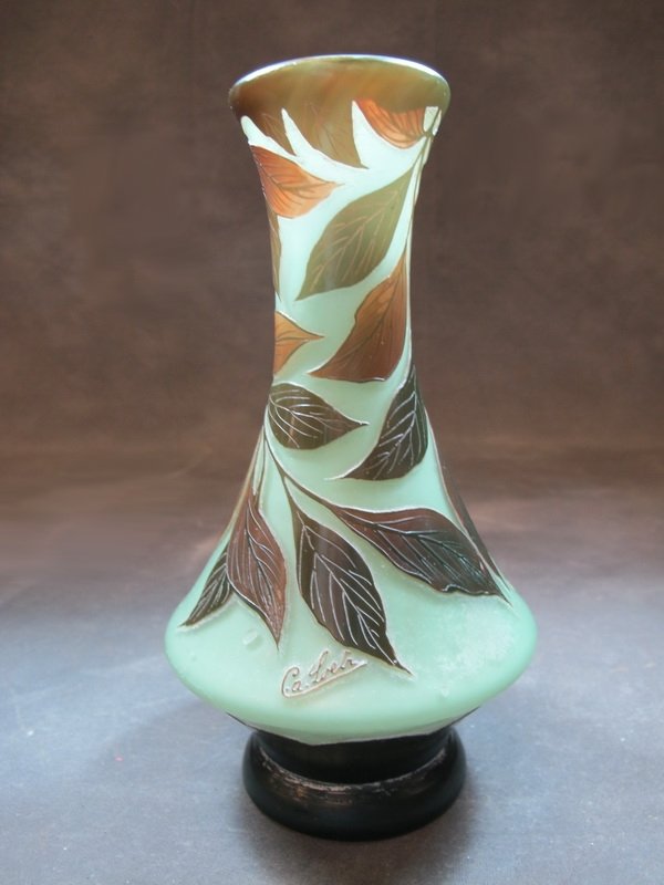 French Art Deco signed cameo glass vase: French Art Deco signed cameo glass vase. 8 1/4” H. Shipping in USA is $ 30.00. International bidders ask for shipping before bid.