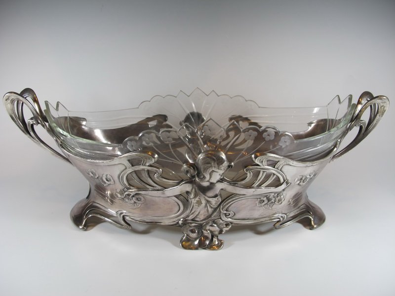 Antique German WMF silverplate & glass centerpiece: Antique German WMF silverplate & glass centerpiece, marked. 6 1/8” H x 17 1/8” W. Shipping in USA is $ 55.00. International bidders ask for shipping before bid.