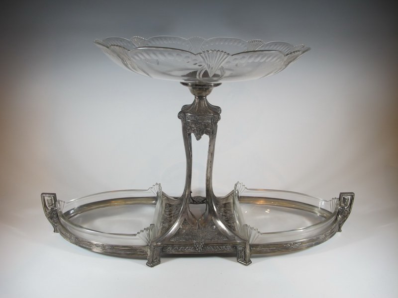 Antique German WMF silverplate & glass fruit stand: Antique German WMF silverplate & glass fruit stand, marked. 12 7/8" H x 21 5/8” W x 12” D. Shipping in USA is $ 100.00. International bidders ask before bid.