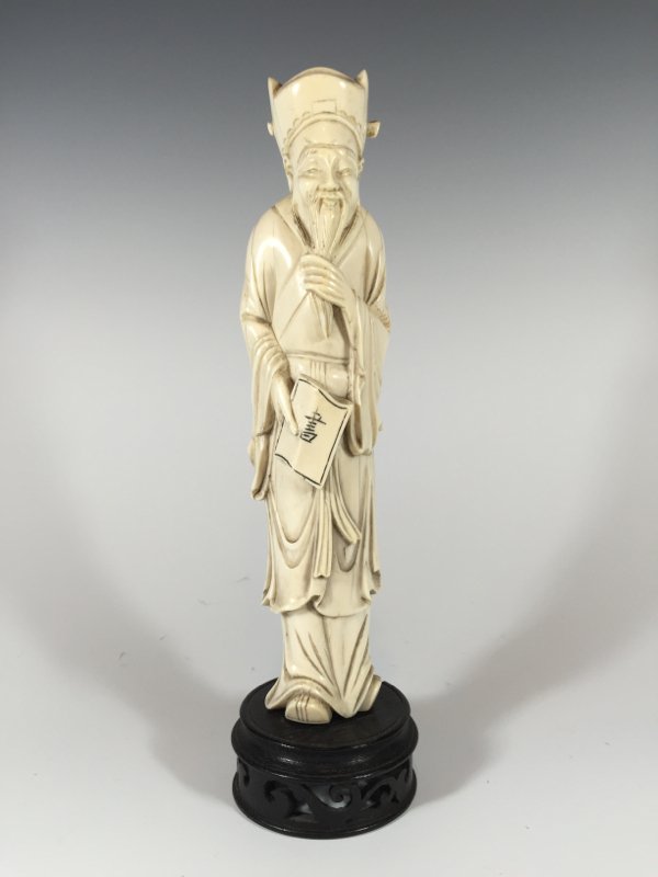 Chinese carved ivory figure.: Chinese hand carved ivory figure of wise man on a wood base. 9 1/4"H. Shipping in USA is $ 30.00. INTERNATIONAL CLIENTS ARE INELIGIBLE TO BID ON THIS ITEM. THIS ITEM IS FOR SALE ONLY WITHIN THE UNITED