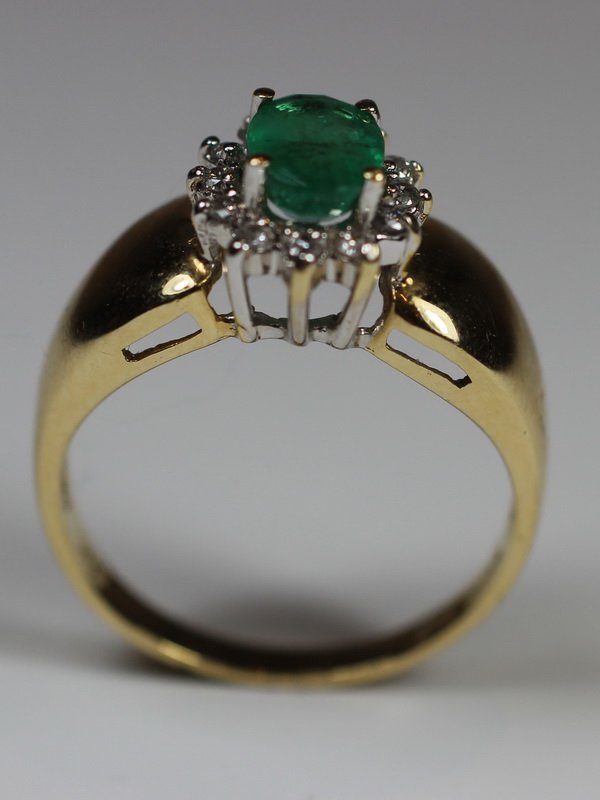 14 kt gold and 3/4 ct emerald ring: 14 kt gold and 3/4 ct emerald ring, marked.Size: 7 1/2 Packing & shipping in the USA is $ 10.00. International bidders ask for shipping before bid.