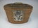Antique Chinese teapot in a rattan basket - 2