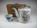 Antique Chinese teapot in a rattan basket - 4