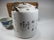 Antique Chinese teapot in a rattan basket - 6