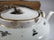 Antique Chinese teapot in a rattan basket - 8
