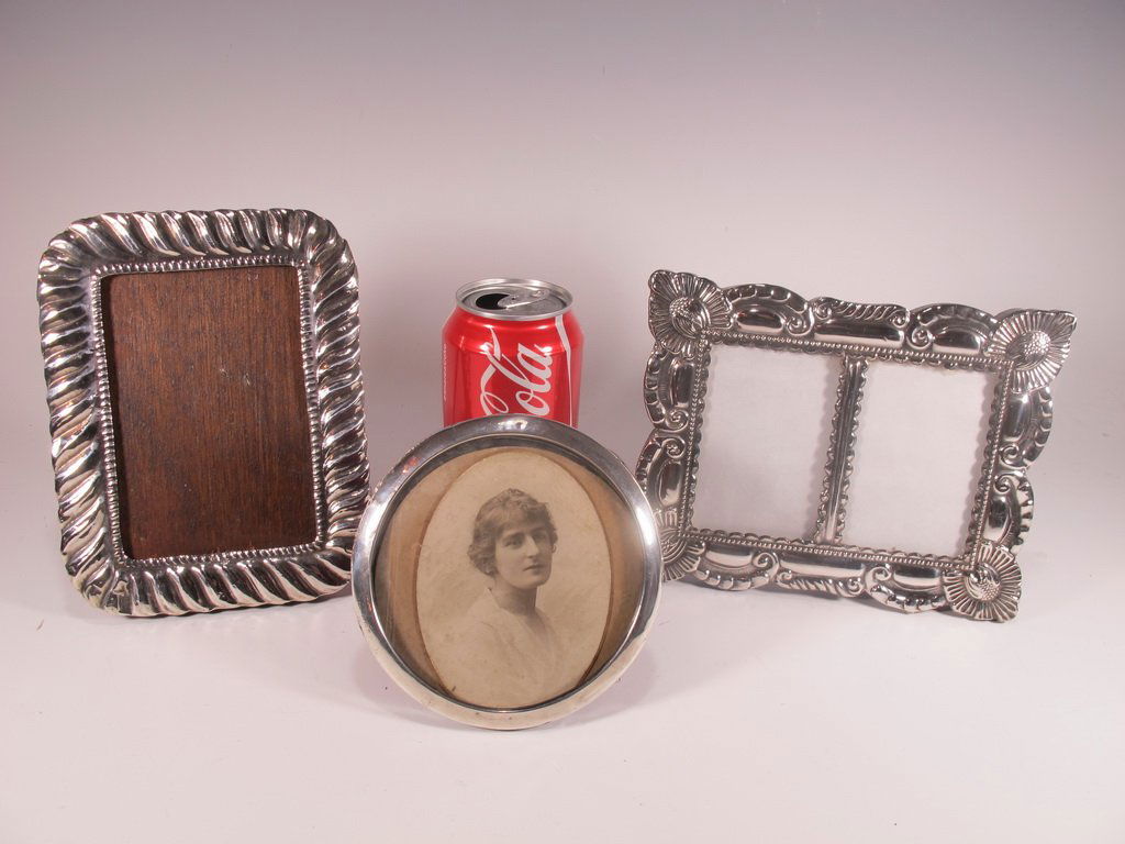 Set of 3 sterling 925 picture frames: Set of 3 sterling 925 picture frames. Round: 4 1/2” W, Rectangular: 6 3/4” H x 5 1/4” W (4 7/8” H x 3 1/8” W picture), Duble: 7 1/4” H x 5 5/8” W (3 5/8” H x 2 1/4” W picture). Shipp