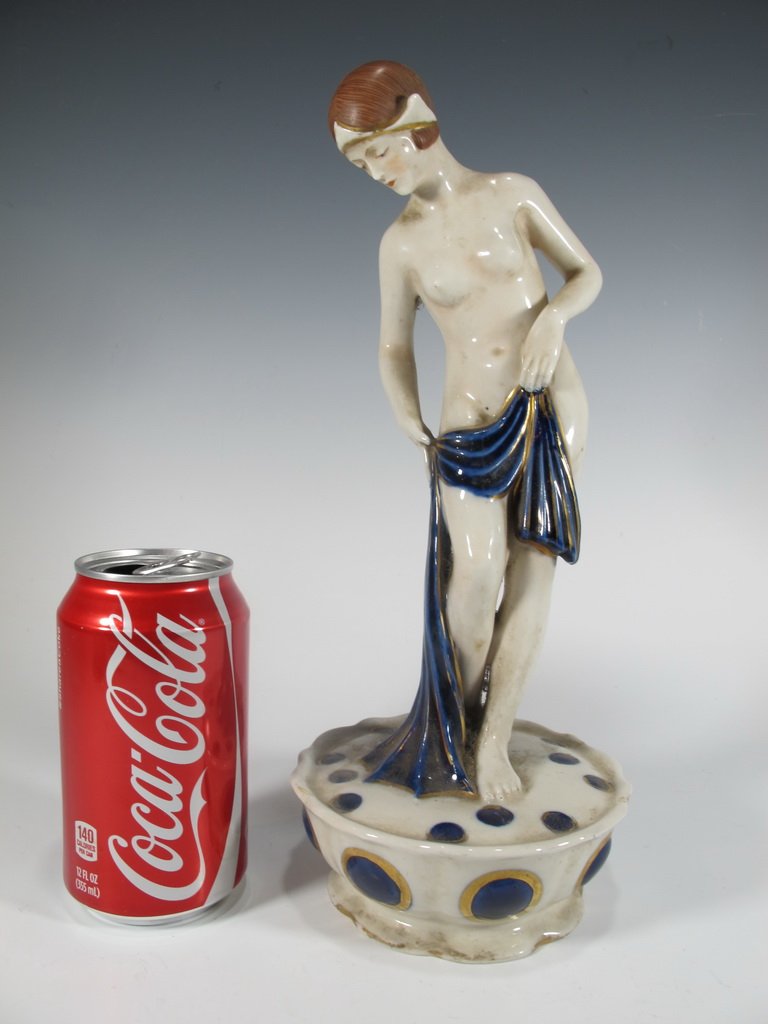 Royal Dux Art Deco porcelain figurine: Royal Dux Art Deco porcelain figurine. 11 7/8" H. Shipping in USA is $ 30.00. International bidders ask before bid.