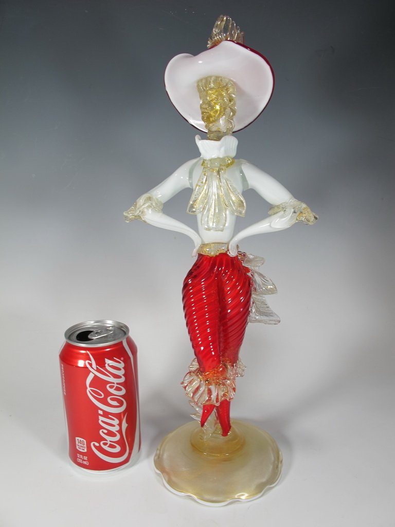 Antique Italian murano figure: Antique Italian murano figure. 15” H. Shipping in USA is $ 35.00. International bidders ask before bid.