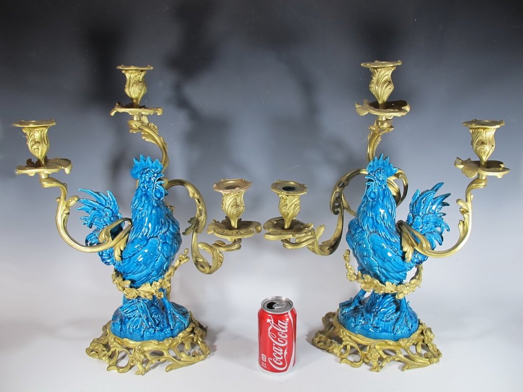 Pair of gilt bronze & turquoise glazed porcelain: Pair of gilt bronze & turquoise glazed three branch porcelain candelabra, late 19th Century. 20 3/8” H x 15 3/4” W. Shipping in USA is $ 120.00. International bidders ask for shipping before bid.