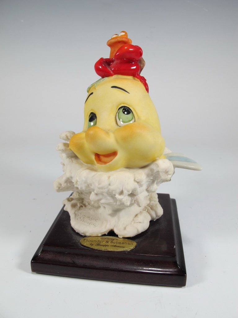 Flaunder & Sebastian, Giuseppe Armani 1998 Disney: Flaunder & Sebastian, Giuseppe Armani 1998 Disney figurine. 4 7/8" H. Shipping in USA is $ 30.00. International bidders ask before bid.