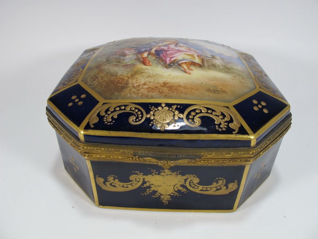 Antique French Sevres bronze & porcelain box: Antique French Sevres bronze & porcelain box, signed. 3 1/2” H x 7 1/2” W x 7 1/2” D. Shipping in USA is $ 35.00. International bidders ask for shipping before bid.