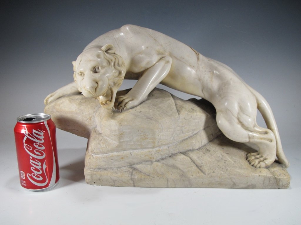 Antique European panther alabaster sculpture: Antique European panther alabaster sculpture. 11" H x 18” W x 9” D. Shipping in USA is $ 55.00. International bidders ask before bid.