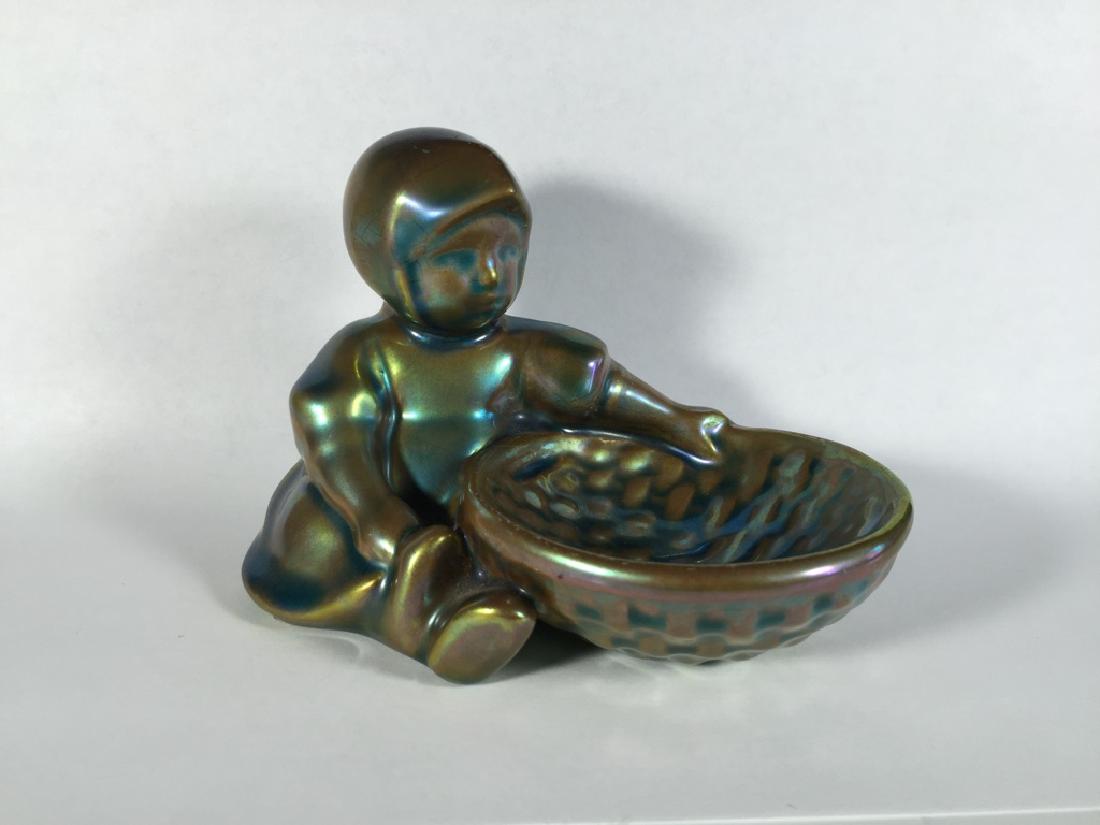 Zsolnay iridescent porcelain statue, Hungary: Zsolnay iridescent porcelain statue, Hungary, marked. 3 1/8” H x 4 3/8” W x 2 1/2” D. Shipping in USA is $ 10.00. International bidders ask for shipping before bid.
