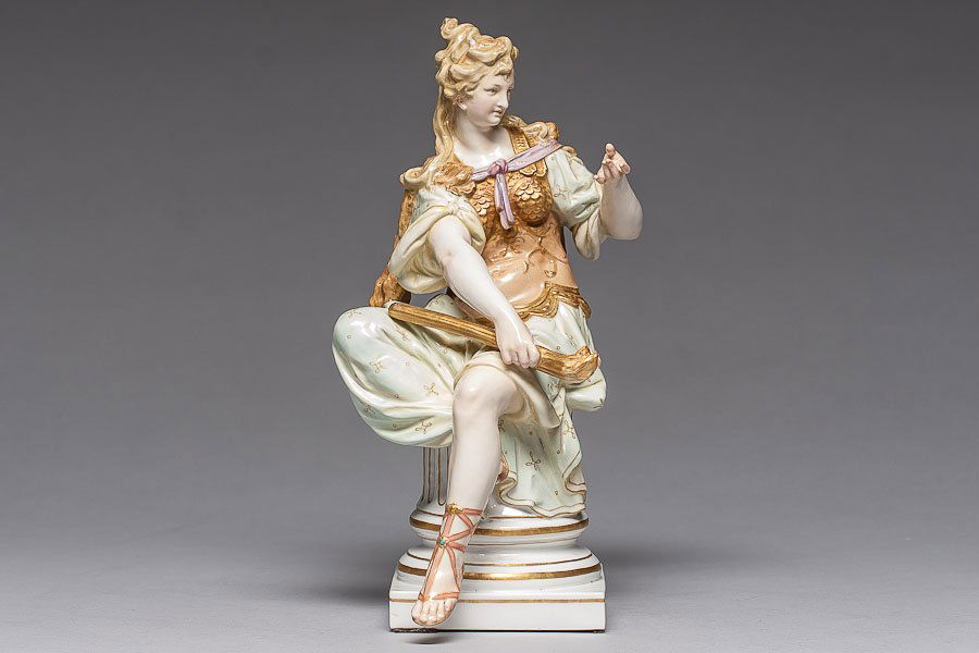KPM PORCELAIN FIGURINE: Porcelain figurine of female with torch, mark on the bottom KPM, c. 1935. Size: H- 10” (25.5 cm), base 3 ½” x 3 ½” (9 x 9 cm)