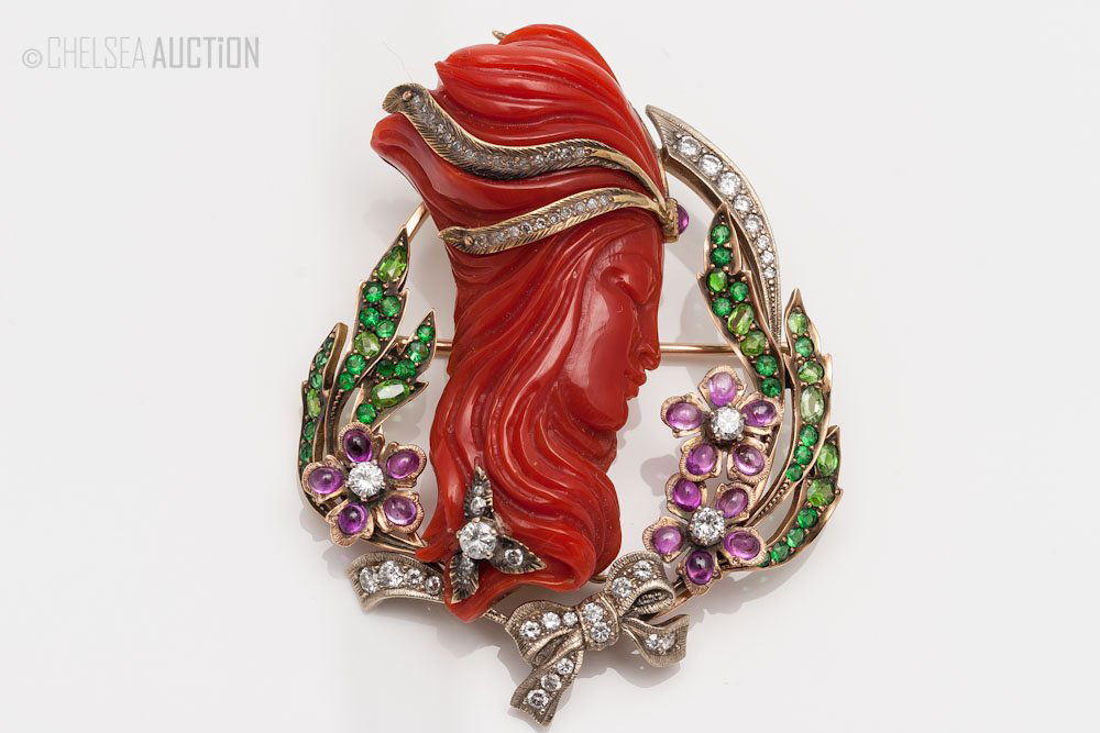 14k Yellow Gold Art Deco Brooch w/ Various Jewels: 14k (no mark) Yellow gold Art Deco brooch with coral, diamonds, rubies and emeralds. SIZE: L 2 1/4 in and W 1 3/4 in (6 cm x 4.5 cm) WEIGHT: 30.2 g.