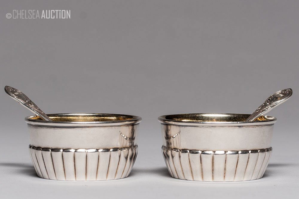 1895 Russian Fabergé Silver Salt Cellar & Spoon: 1895 Russian, two silver gilded salt cellars with spoons. Hallmarked Moscow, Imperial warrant and 84 standard (916/1000 silver), maker mark Cyrillic “K.FABERGÉ”. Spoons have maker mark Grachev. S