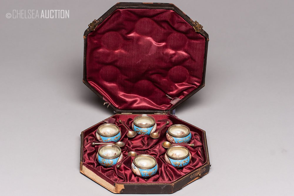 19th C Viennese Enamel & Silver Salt Set: 19th century Austrian enamel and gilded silver salt cellars with spoons (set of six). SIZE: Salt cellars: L 1 1/2 in and W 1 1/2 in (4 cm x 4 cm) Spoons: L 2 in and W 1/2 in (5 cm x 1.5 cm) WEIGHT: 4.