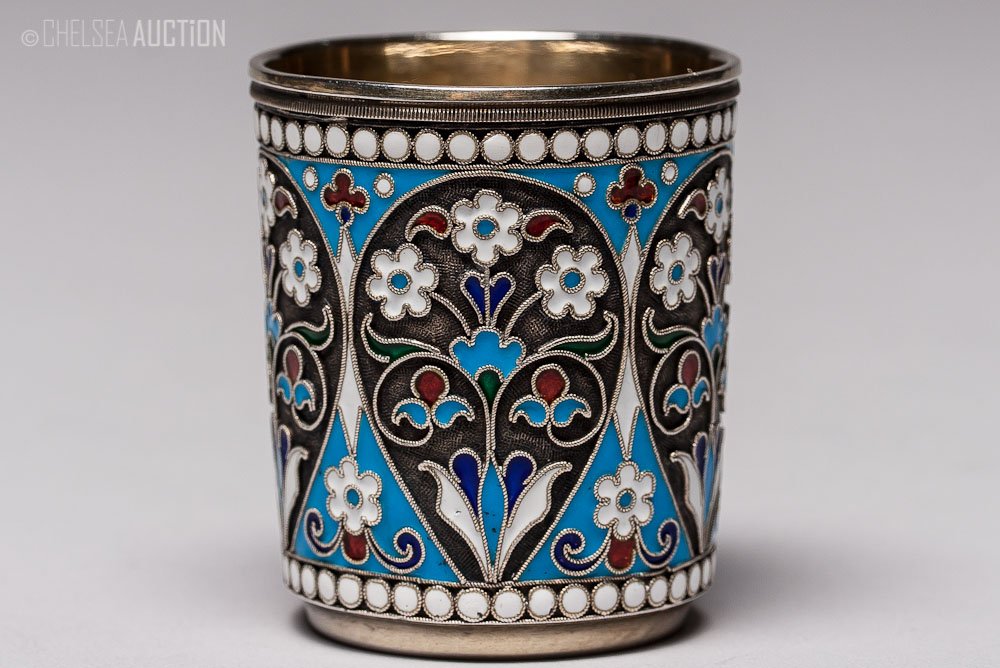 19th C. Russian Silver & Enamel Shot Glass: 1899 Russian silver multi-color enamel shot glass. Hallmarked silver 84 standard (875/1000 silver), maker mark Cyrillic “B.A.”. SIZE: H 1 3/4 in and D 1 1/2 in (4.5cm x 4cm) WEIGHT: 48.8 g