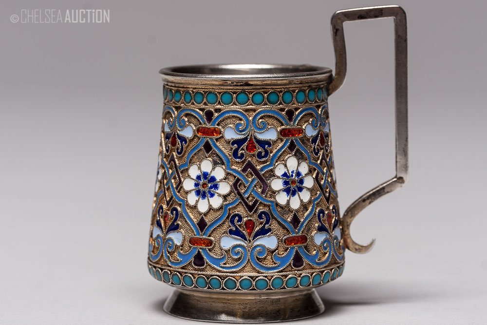 19th C. Russian Silver & Enamel Shot Glass: 1888 Russian, silver multi-color enamel shot glass. Hallmarked Moscow, 84 standard (875/1000 silver), maker mark Cyrillic “A.P.”. SIZE: L 2 1/2 in and W 2 in (5.5cm x 5cm) WEIGHT: 44.3 g
