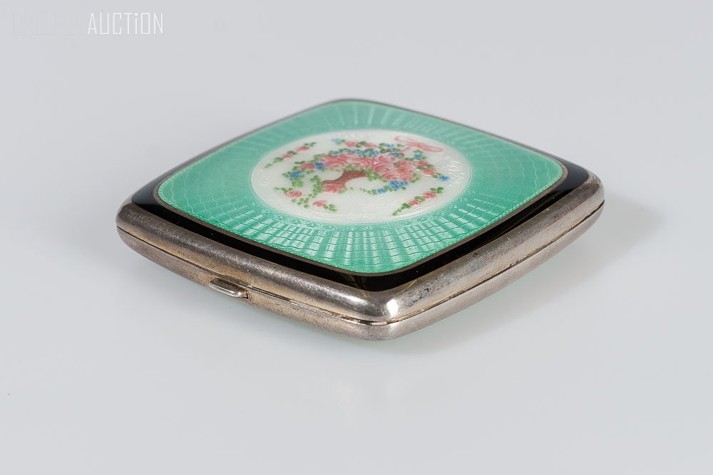 Early 20th C. Austrian Silver Green Enamel Compact: Beginning of 20th Century, Austrian silver dark green enamel compact. Maker Mark: F & B Stering. Diameter: 2.5 inches (6.5cm) x 2.5 inches (6.5cm)