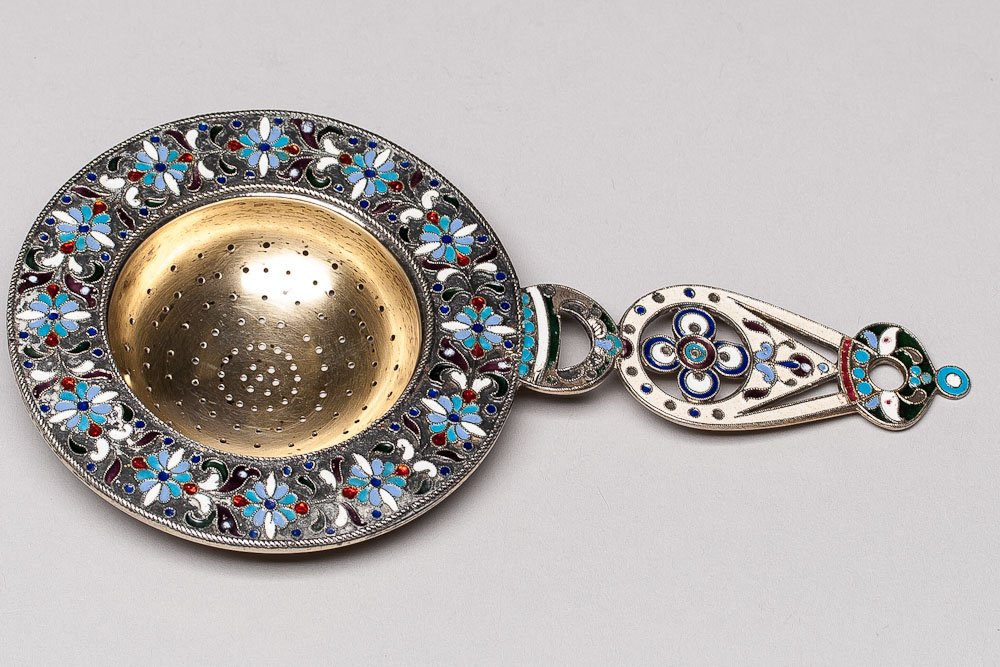 Russian Silver Multi-Color Enamel Tea Strainer: 1908-1914 Russian silver multi-color enamel tea strainer. Hallmark 84 standard (875/1000 silver). SIZE: L 6 in and W 3 1/4 in (15cm x 8cm) Weight: 48.3 g