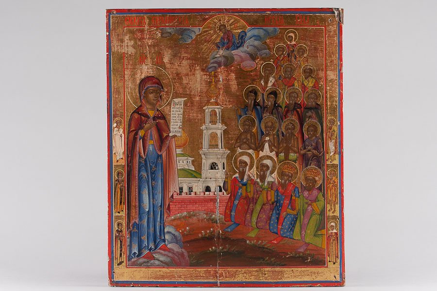 Russian Icon: Bogoliubskaya: Early 19th Century icon. Nevnyansk, Ural region. Egg tempera, gold leaf and gesso on wood panel. Two inset spinets on top and bottom. Size: 17 1/2" x 15" (44.5 x 38 cm)