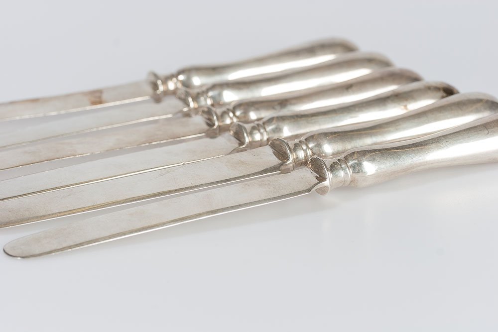 1895 Russian Six Piece Silver Desert Knife Set: 1895 Russian six piece silver desert knife Set. Handle and blade are silver. Silver Mark 84 Standard, Moscow. Maker Mark: K. Faberge. Weight: 425 grams 13.67 otz