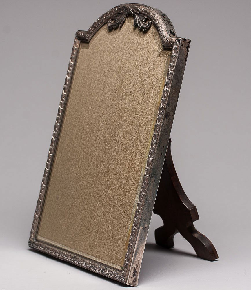 Antique Russian Silver & Wood Frame by Grachev: Russian silver overlaid wooden picture frame with original beveled glass. Hallmarked Moscow, Imperial warrant and 84 standard (875/1000 silver), maker mark Cyrillic "BR. GRACHEV". SIZE: L 13 in and W