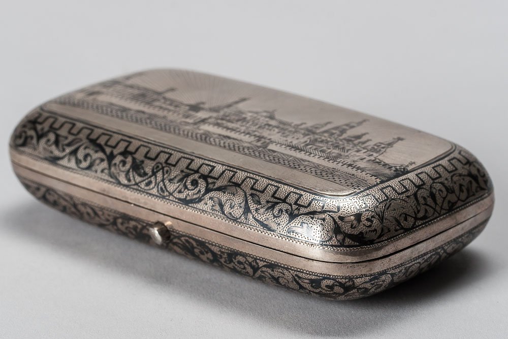 1881 Russian Silver-gilt & niello Cigarette Case: 1881 Russian silver-gilt cigarette case decorated with niello. Hallmarked Moscow, Imperial warrant and 84 standard (875/1000 silver), maker mark Cyrillic F. N. . SIZE: 4 1/4 inches (11cm) x 2 1/2 inch