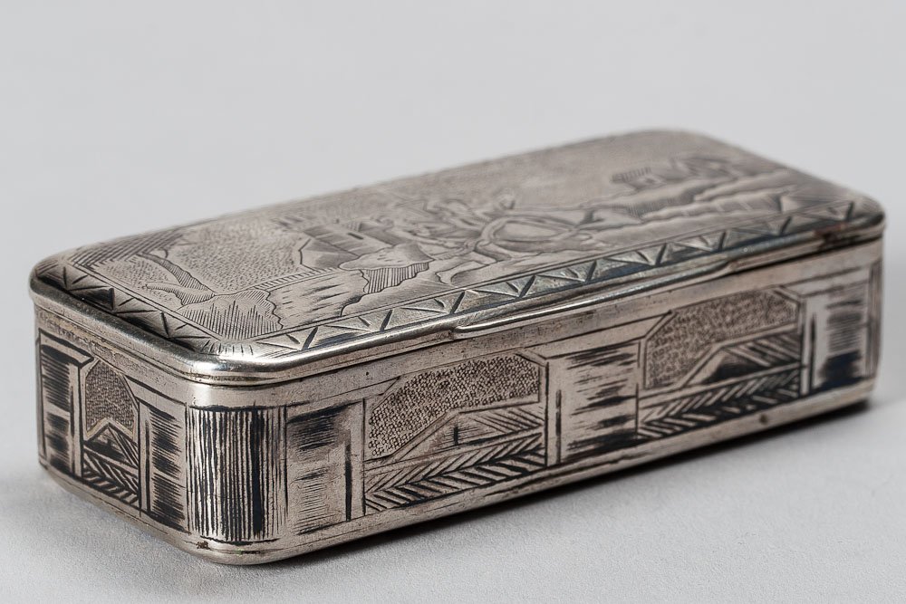 19th C. Russian Silver-gilt Box w/ Niello Decoration: Russian silver-gilt rectangle box with niello decoration, Ca. 1830. Hallmarked Moscow, Imperial warrant and 84 standard (875/1000 silver), maker mark Cyrillic O. E. SIZE: 3 1/2 inches (9cm) x 1 1/2 in