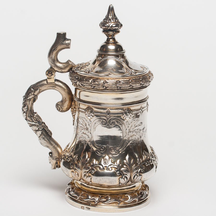 A Large Russian Silver Tankard, 1861: An unusual large Russian silver-gilt tankard in a style of rococo revival, 1861. Hallmarked Moscow, Imperial warrant and 84 standard (875/1000 silver), Katz, maker mark Cyrillic B.C. (Victor Savincov)