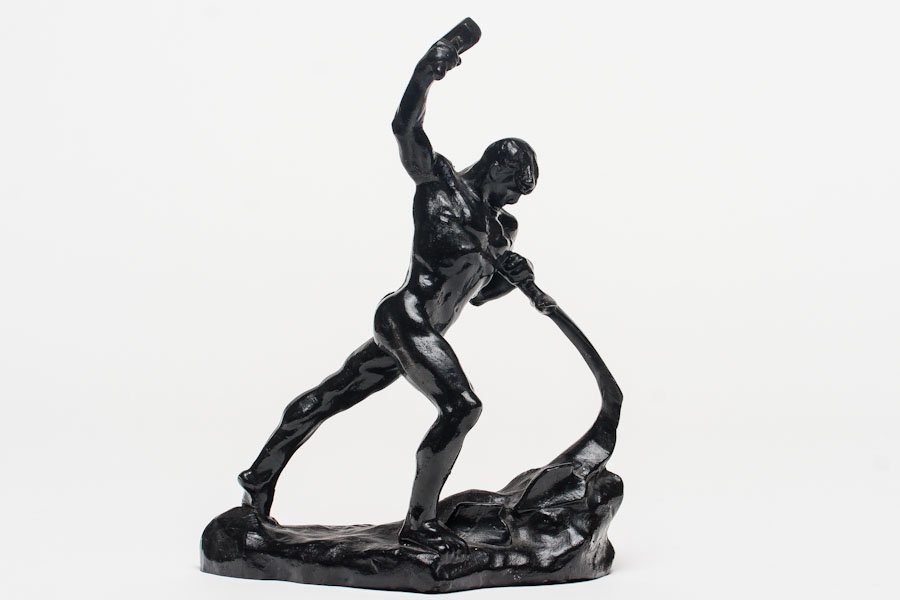 A Statuette after Yevgeny Viktorovich Vuchetich: A Statuette after a model "Let us Beat our Swords to Plowshares" by Yevgeny Viktorovich Vuchetich(1908-74), Russian/Soviet. Inscribed with signature KASLI and has a Soviet "Pentagonal" mark of high qu
