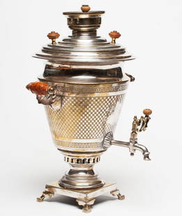 A Silver Plated Samovar, Warsaw: A silver plated samovar, Warsaw. SIZE: H 18 1/2 in (47 cm).