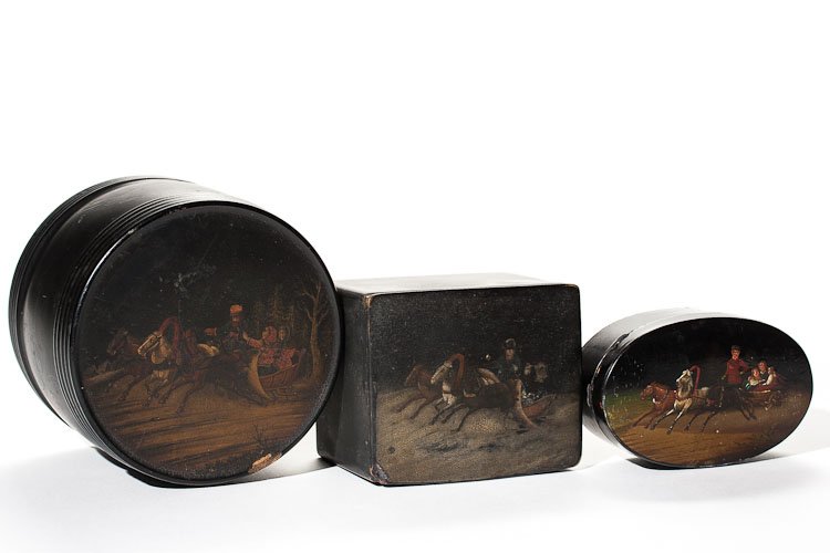 A Set Of Russian Lacquer Boxes, 19th C.: A set of three Russian lacquer boxes. The round box (barrel) and rectangular box with racing troikas in the Winter time, marked with circa 1870 stamp of Vishnyakov Factory, the oval box with racing tr